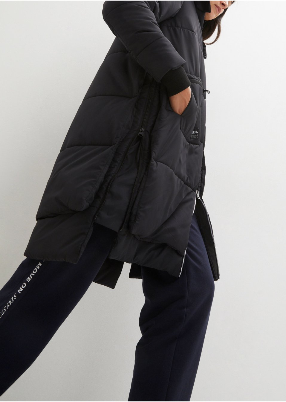 Manteau fonctionnel matelassé style layering