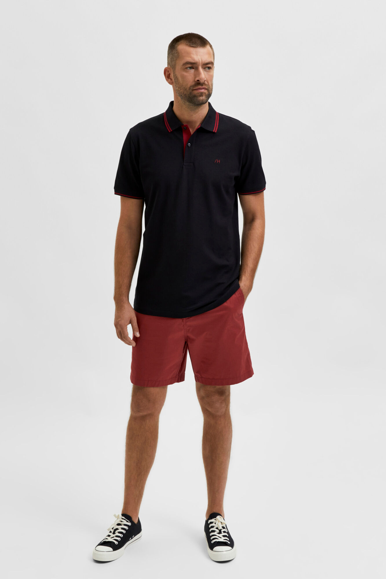 Camisa polo de manga curta com detalhe listrado - Preta