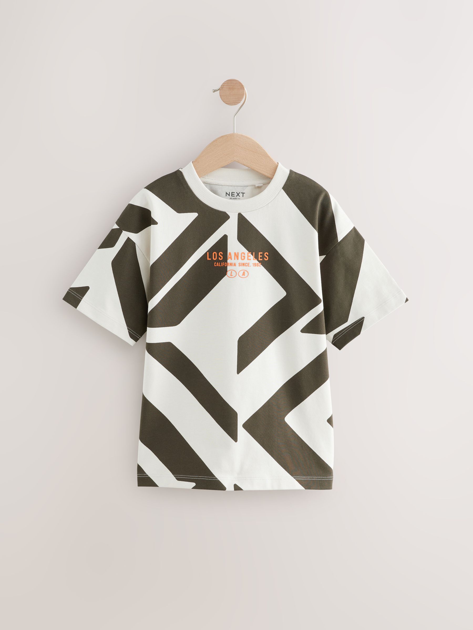 Ecru/antraciet - Ruimvallend T-shirt met korte mouwen en all-over print (3-16jr)
