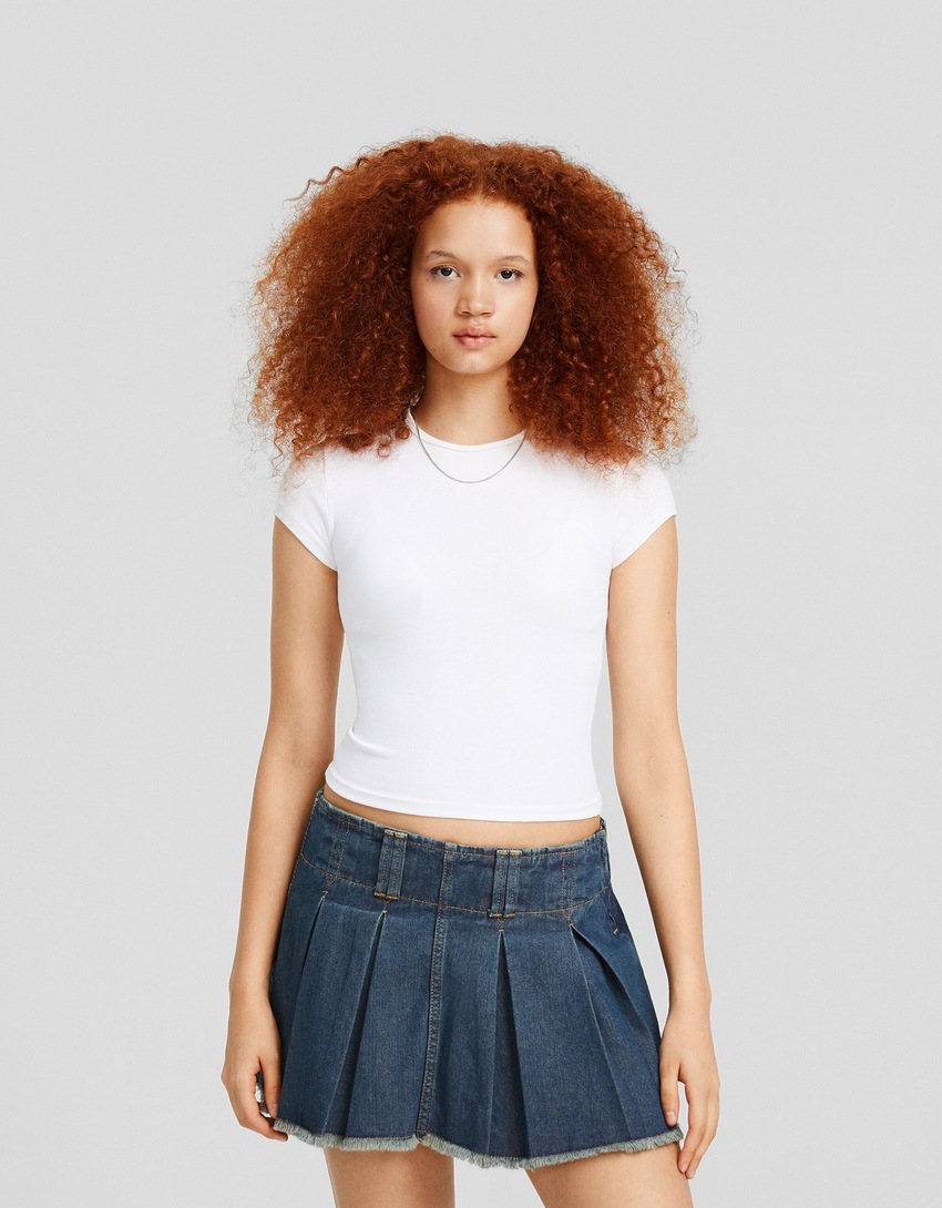 saias-calça plissadas em denim desbotado