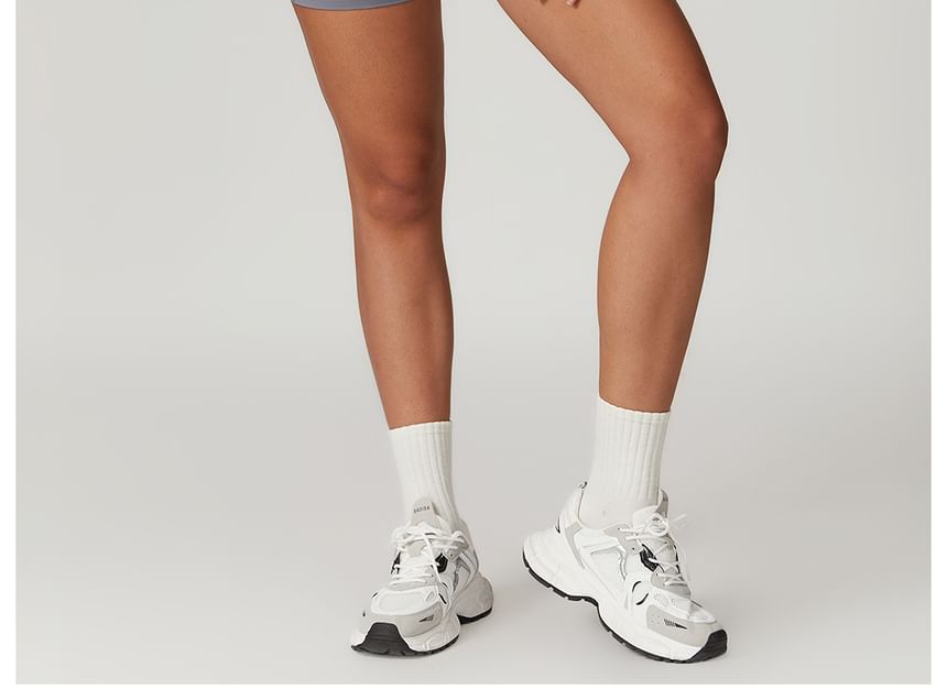 Skinniano - Yoga romper met spaghettibandjes en effen paneel