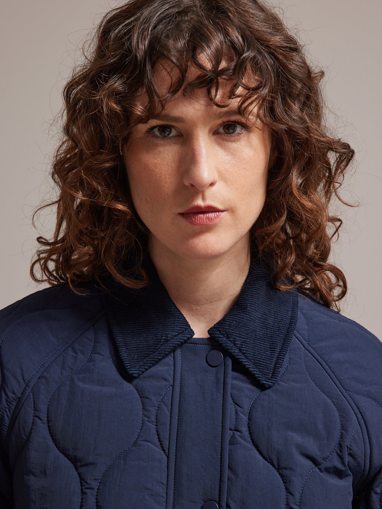 Veste matelassée col velours femme