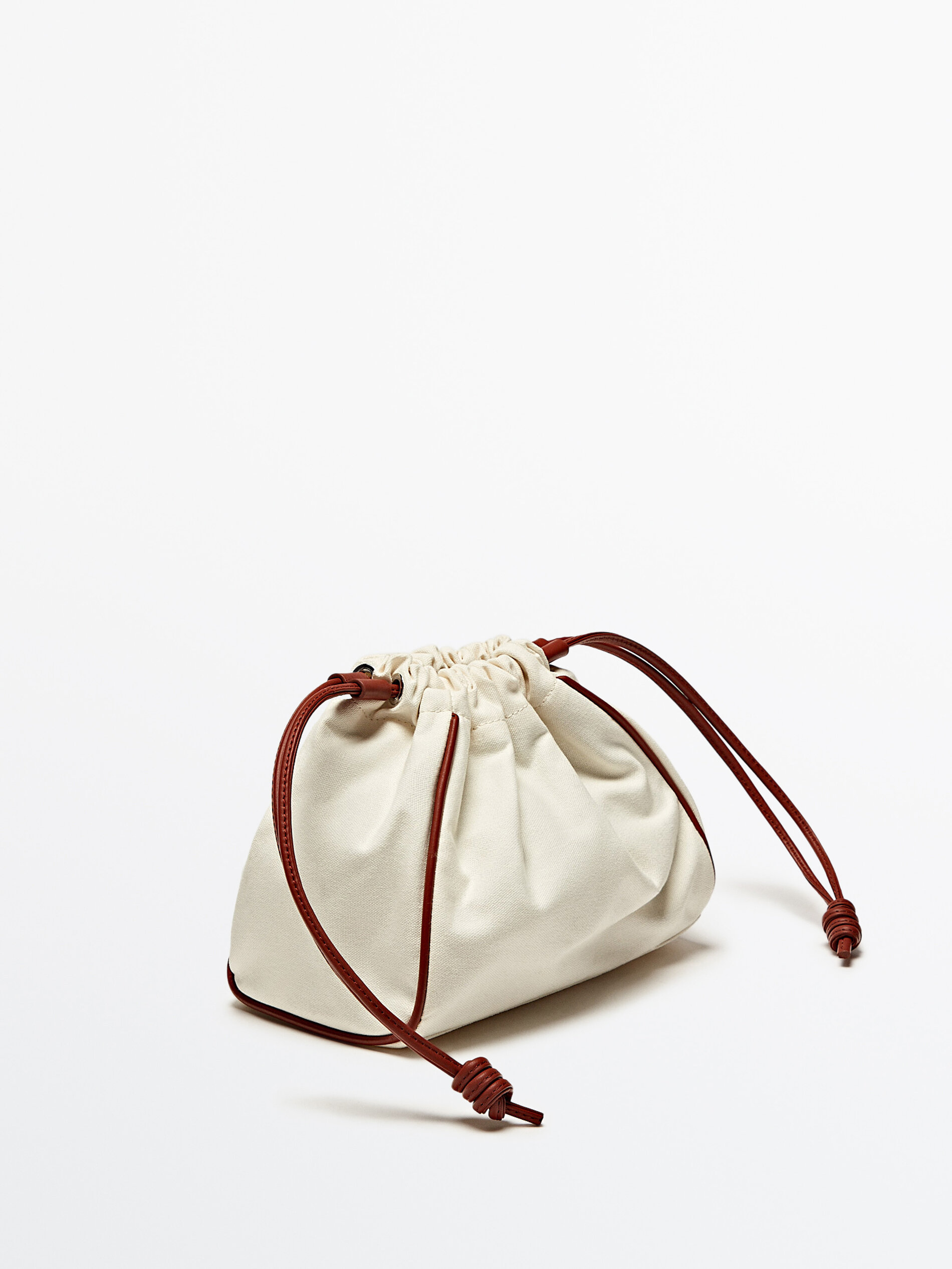Bolsa com detalhes em couro - COURO