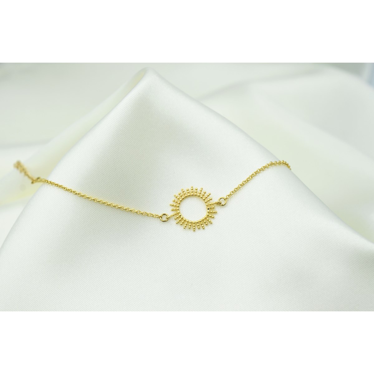 Bracelet doré à l 'or fin pendentif soleil