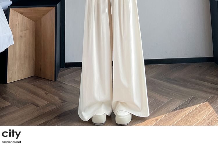 Tel tot 10 - Effen broek met wijde pijpen en trekkoord in de taille (verschillende ontwerpen)