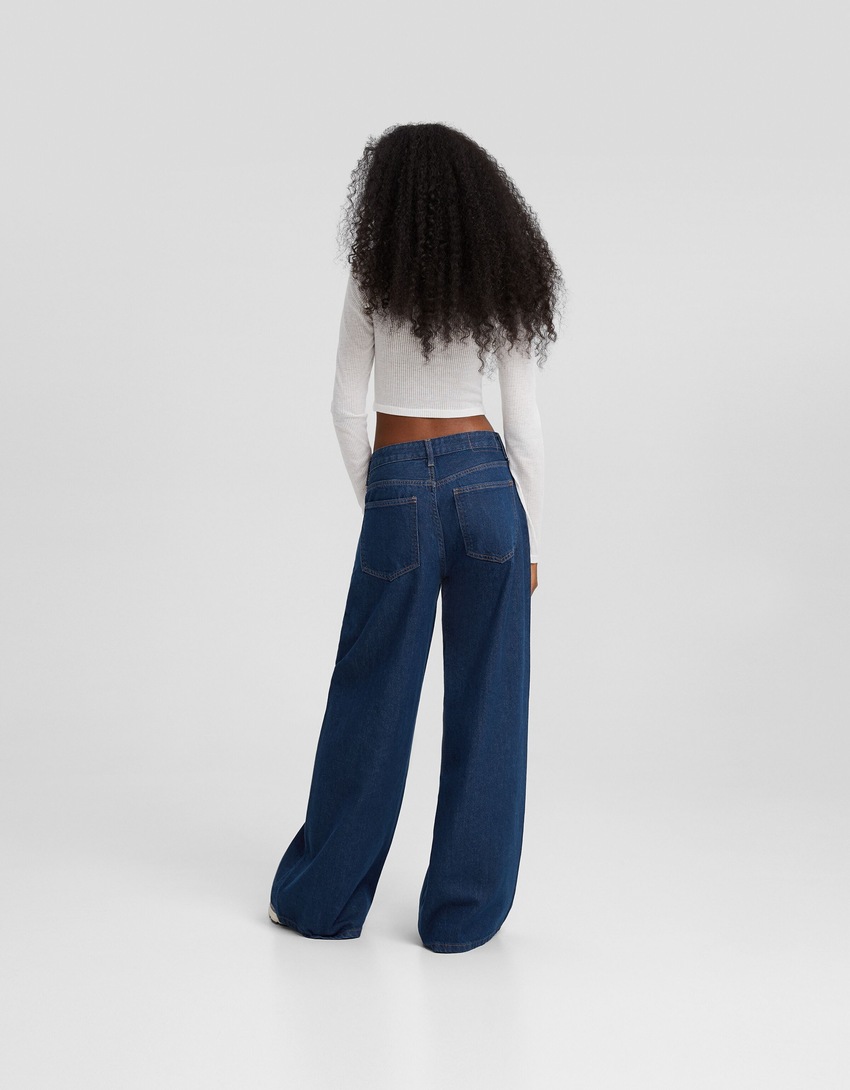 calça jeans de perna larga