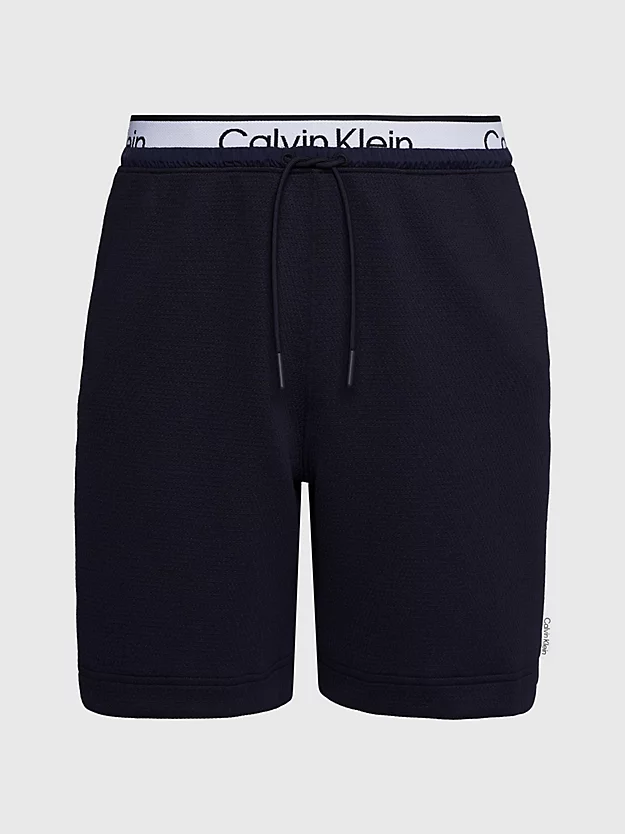 Calções de ginástica em jacquard com cós duplo.
