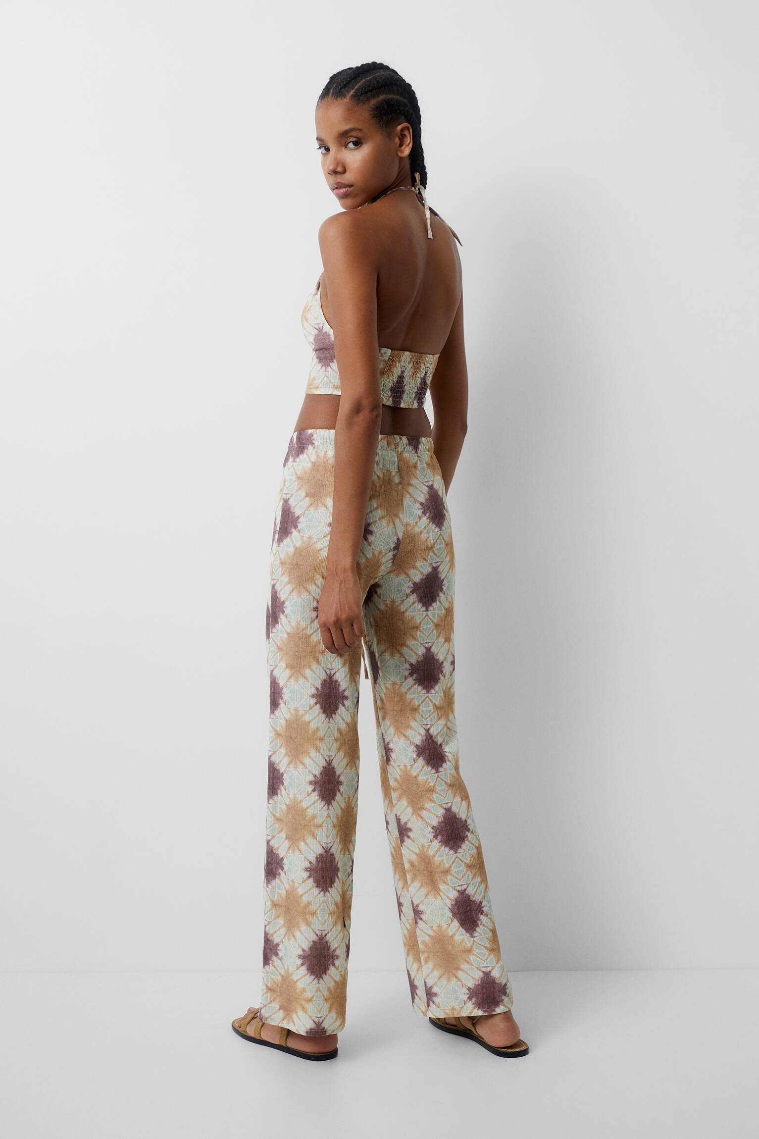 Calça fluida estampada - mostarda
