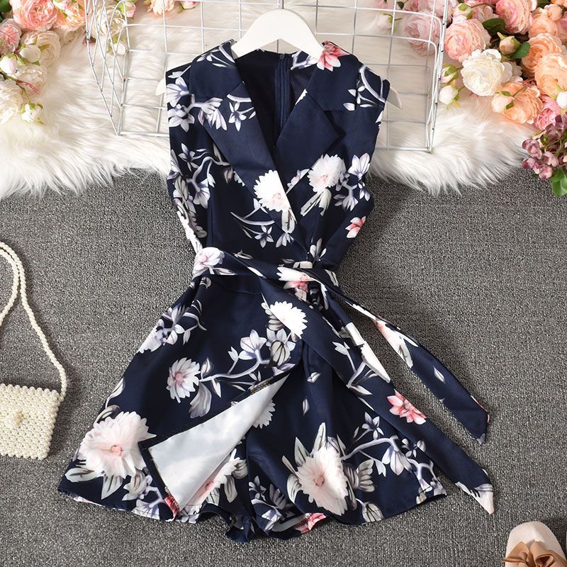 Dudu - Mouwloze romper met bloemenprint en strikceintuur