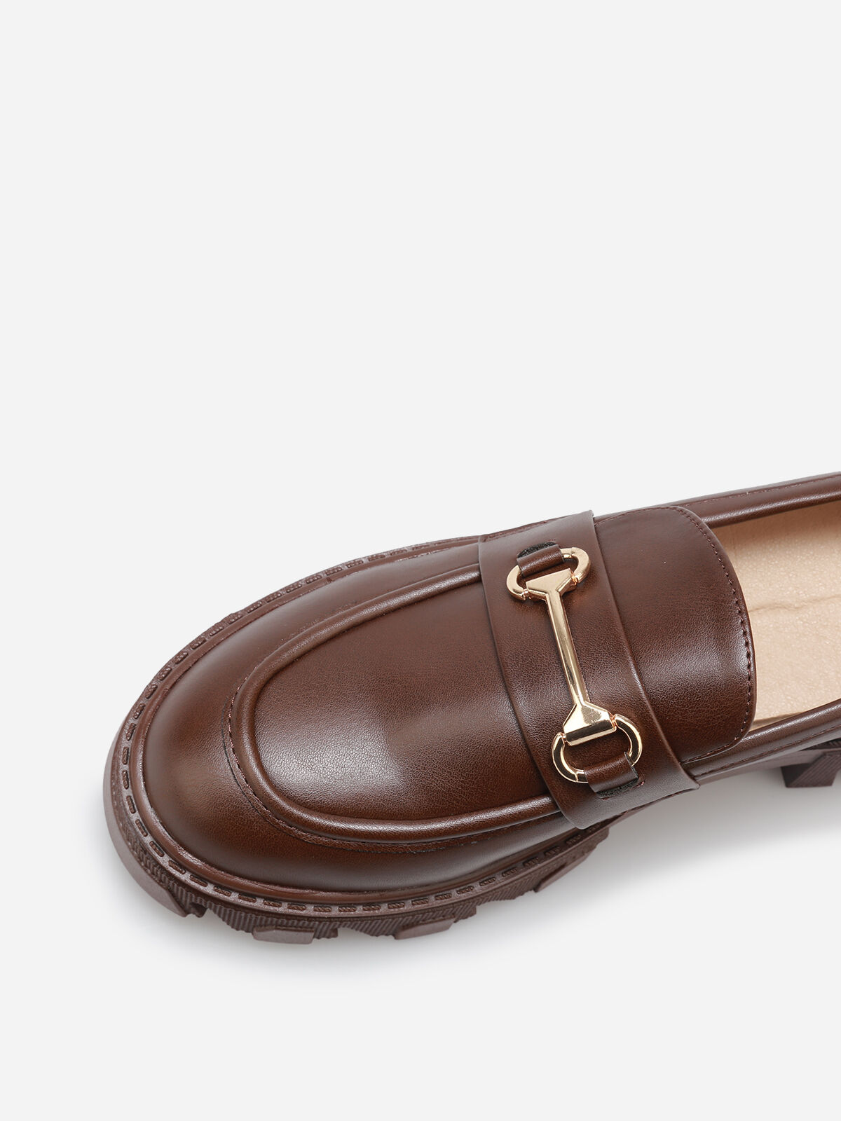 Mocassins crantés à détail métallique- Marron