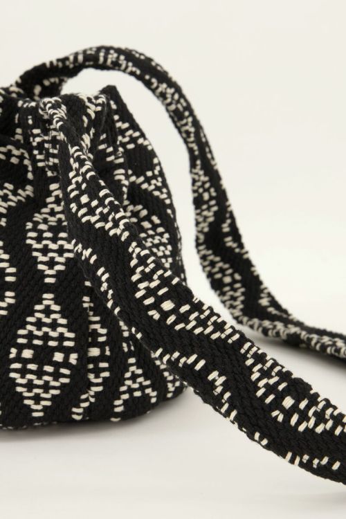 Zwart-witte ronde schoudertas met geweven Aztec print