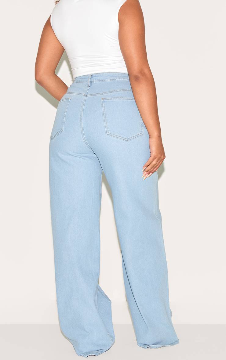 Bleu Clair Jean Taille Haute Jambes Larges En Denim Stretch Sculptant Avec Bouton Ajustable