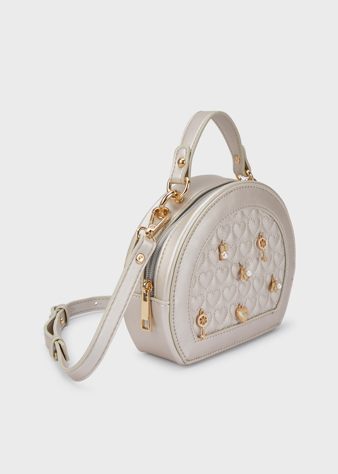 Bolsa com efeito acolchoado e detalhes decorativos para meninas