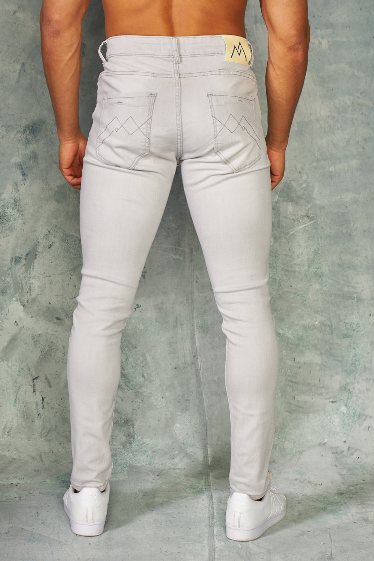 Jeans skinny gris clair griffé