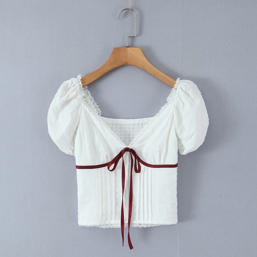 Trisica - Slim-fit crop top met pofmouwen, V-hals, kanten strikaccent