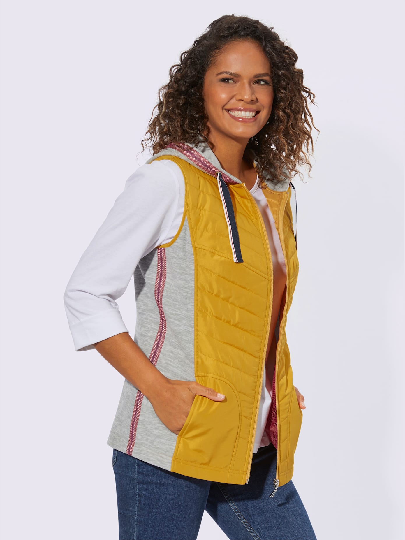 Gilet capuche avec coulisse et lien à nouer