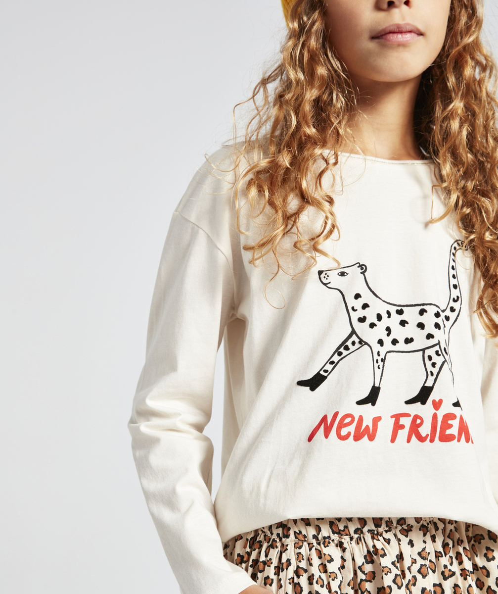 T-SHIRT FILLE EN COTON BIO ÉCRU AVEC LÉOPARD ET MESSAGE