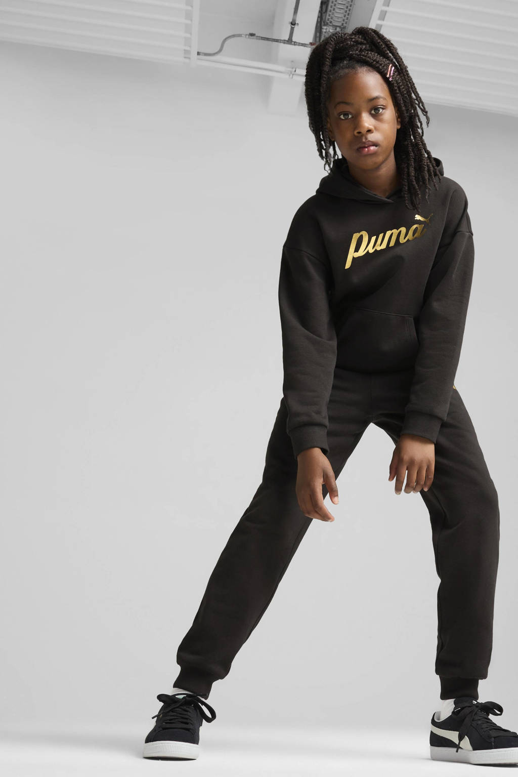 Puma joggingbroek zwart/goudkleurig