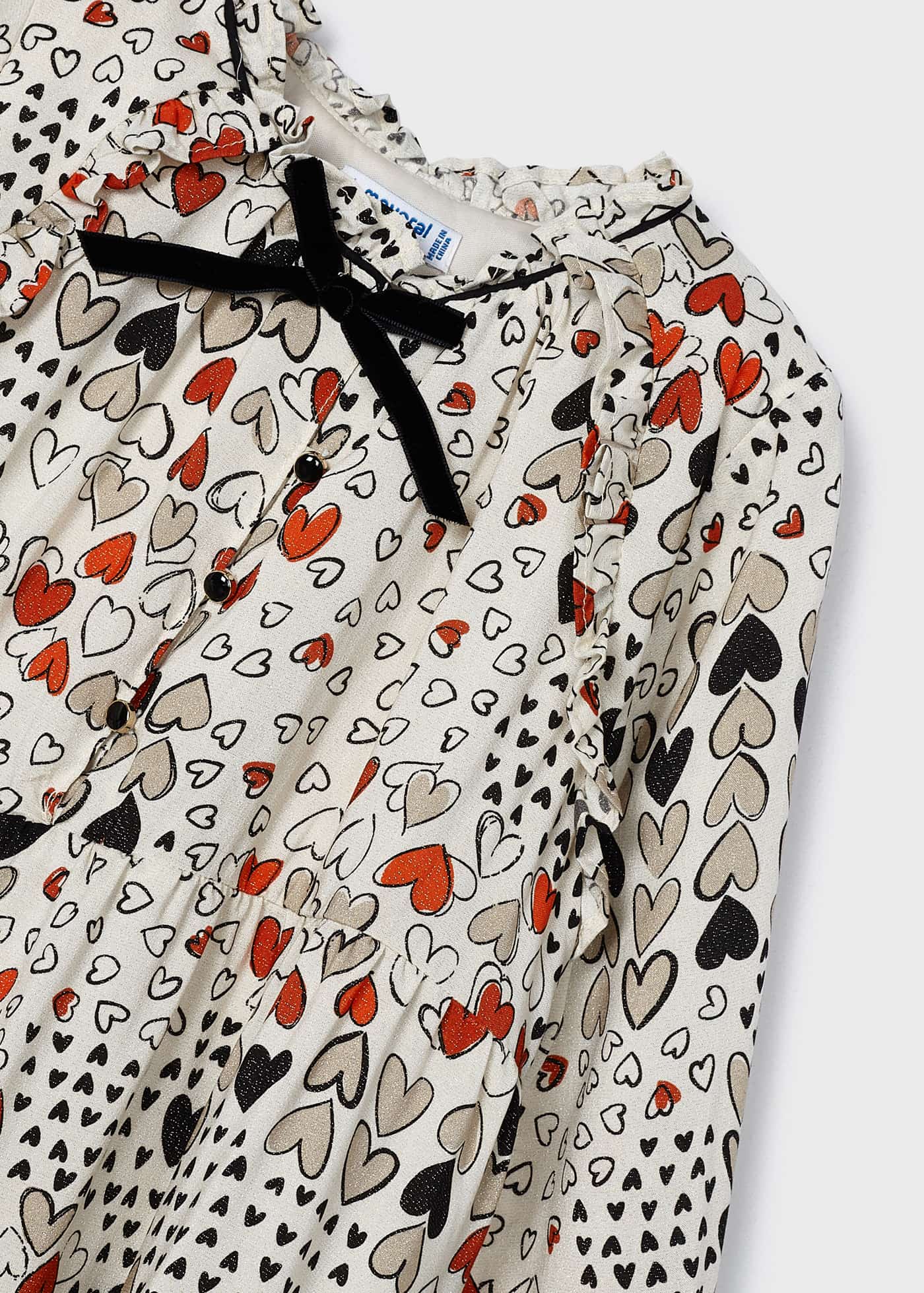 Vestido infantil com estampa de fios metálicos