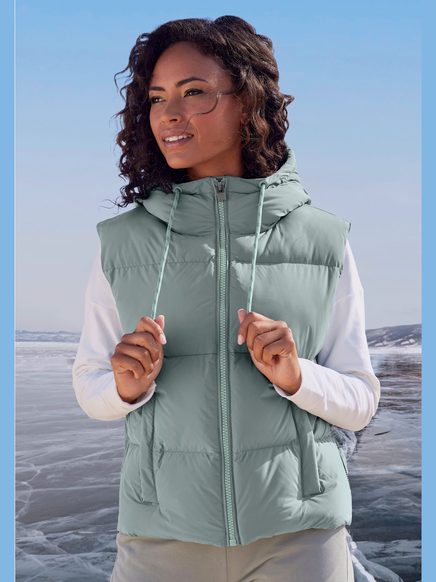 Gilet matelassé doublé avec capuche réglable