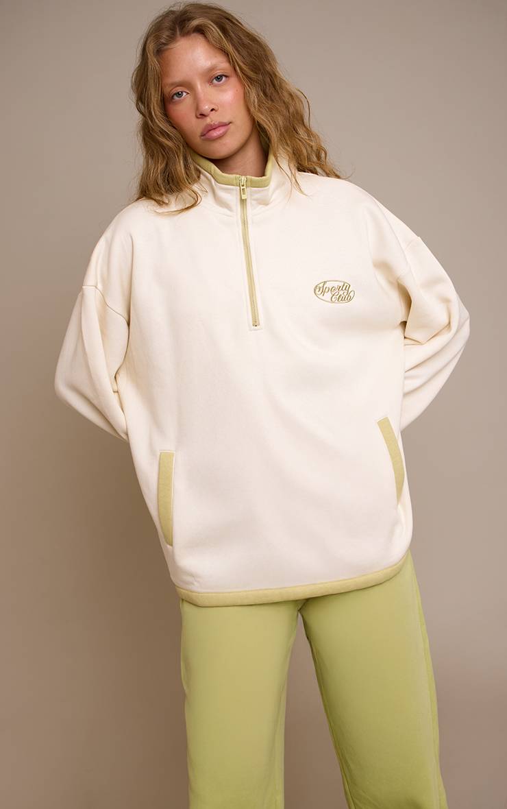 Crème Sweat-shirt Crème À Col Zippé Un Quart Avec Broderie Sporty Club