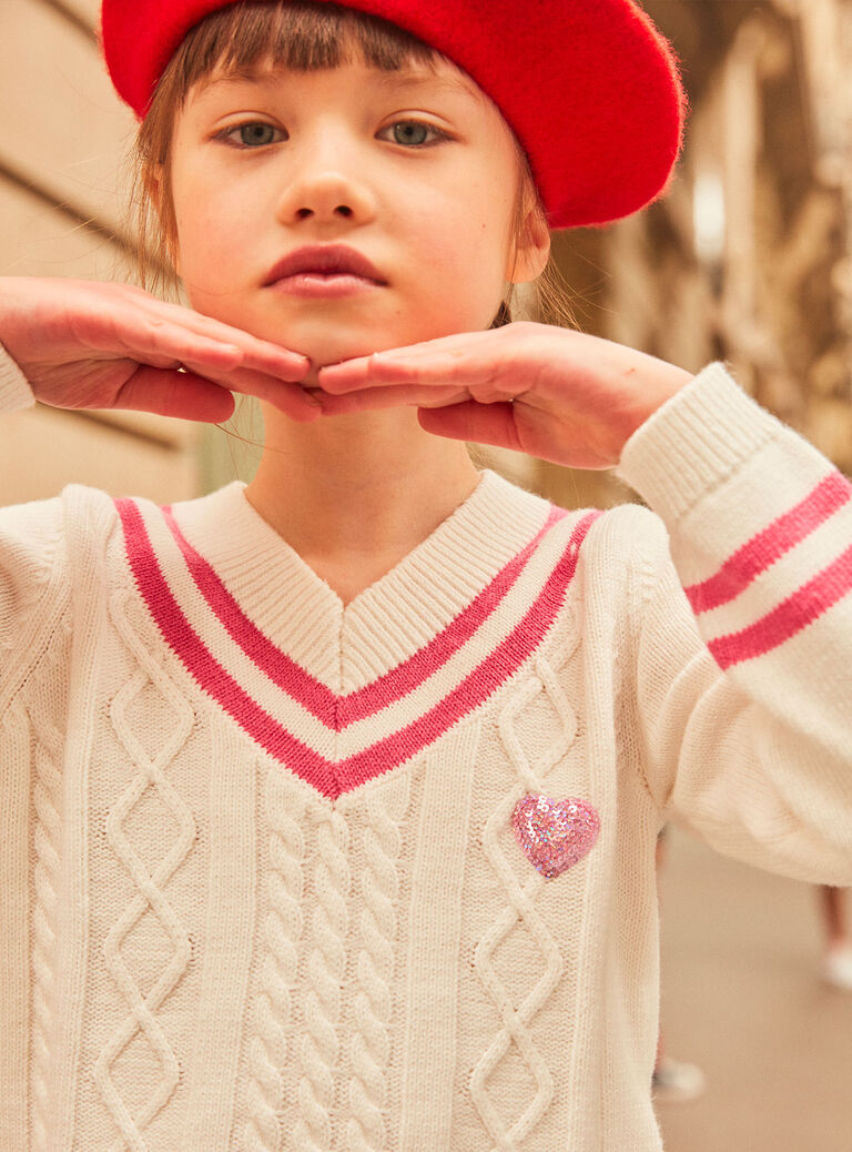Pull écru en maille torsadée