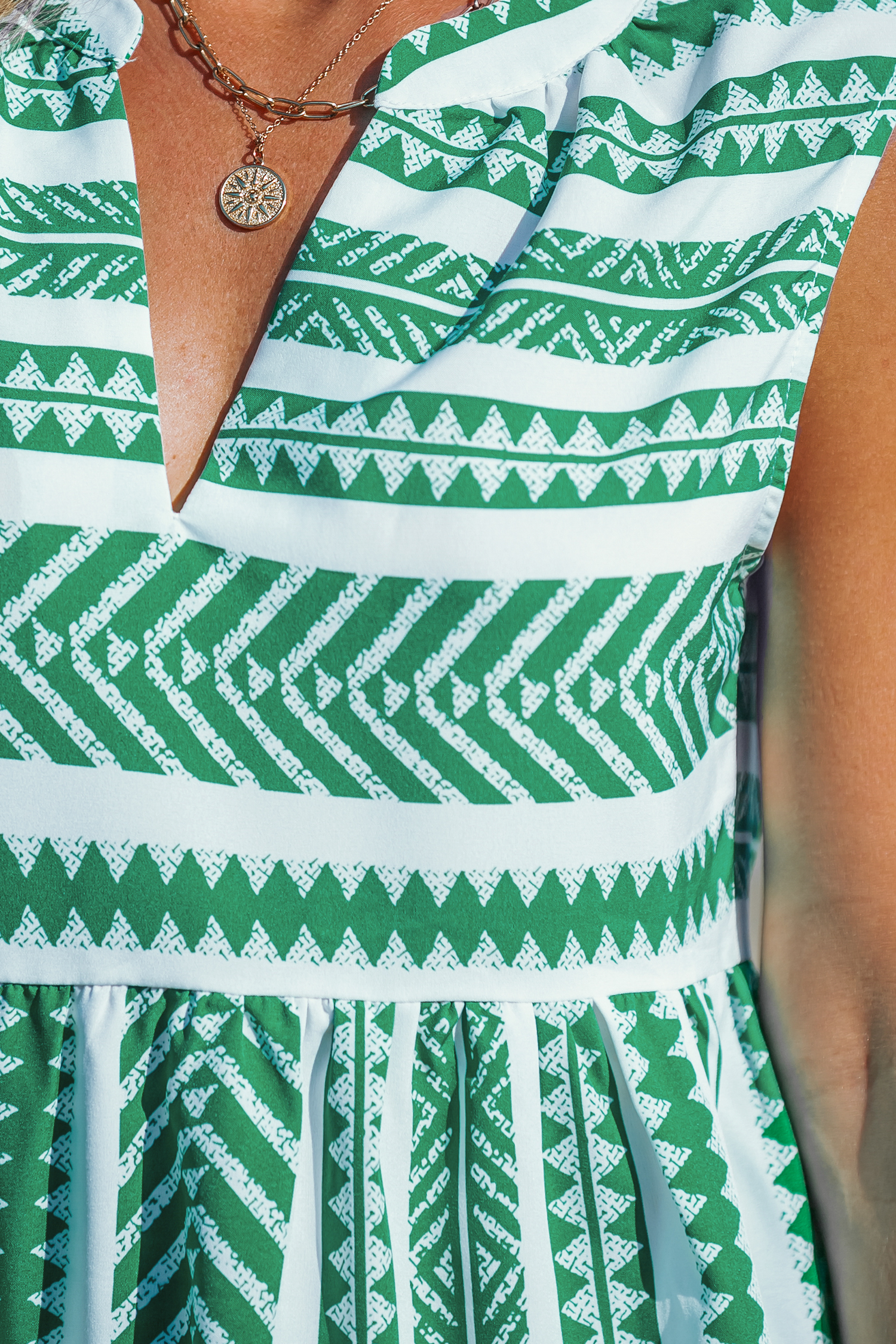 Robe mini géométrique verte et blanche