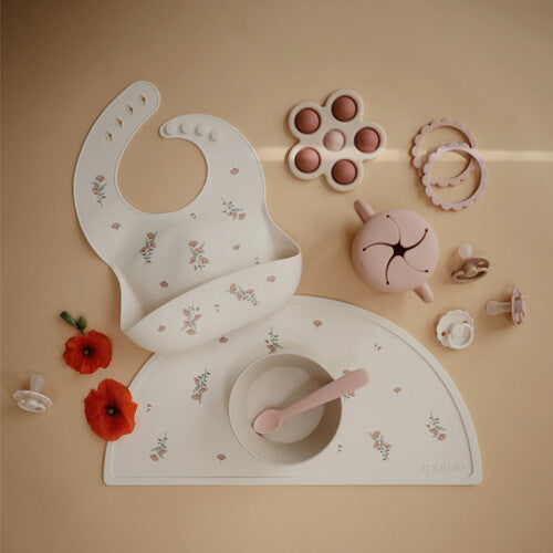 Mushie placemat pink flowers