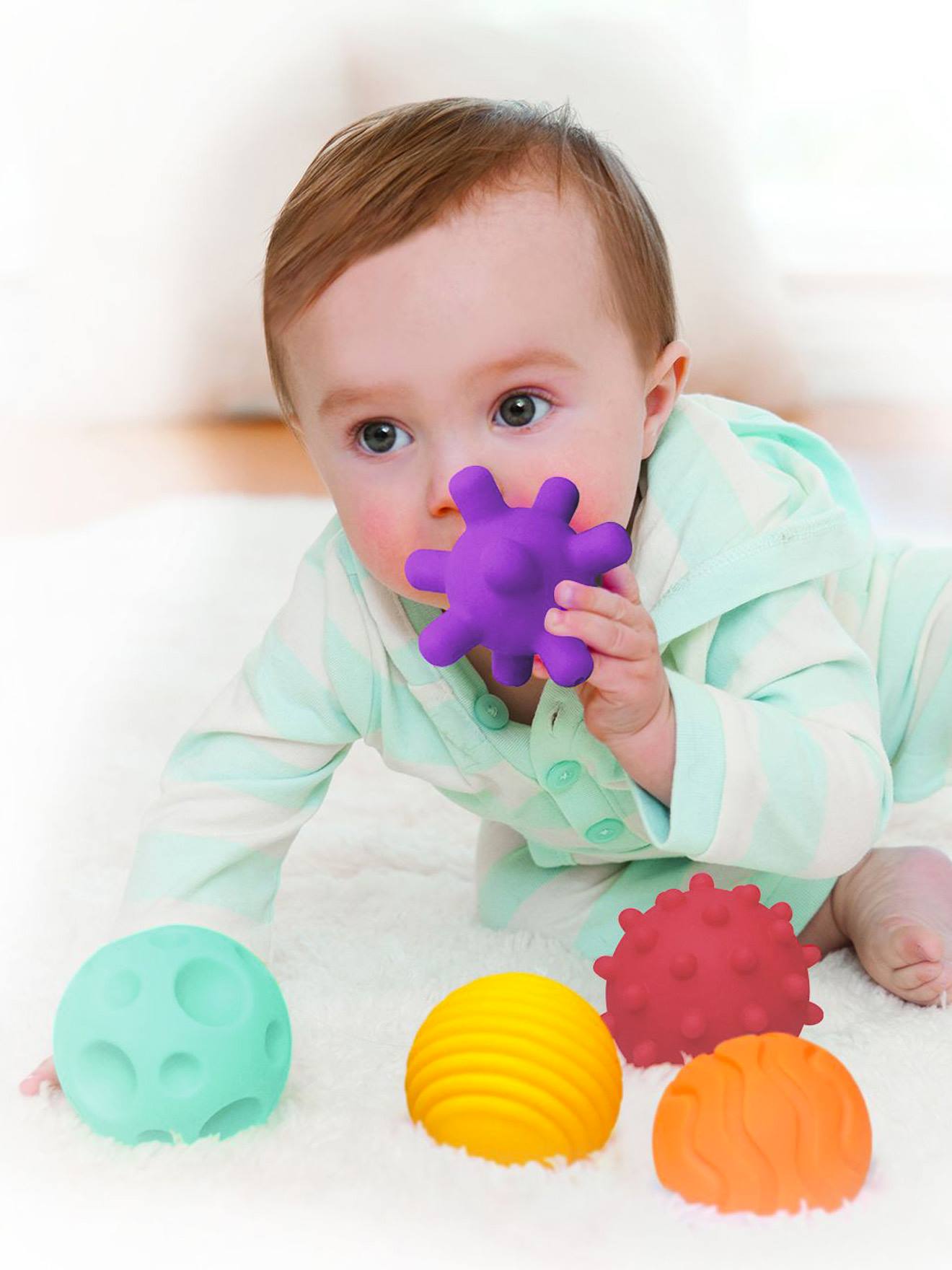 Bolas sensoriais multicoloridas INFANTINO