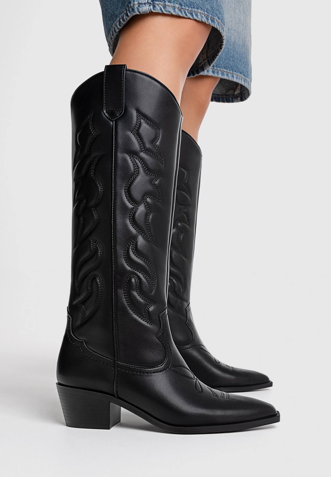 Botas de cowboy até o joelho