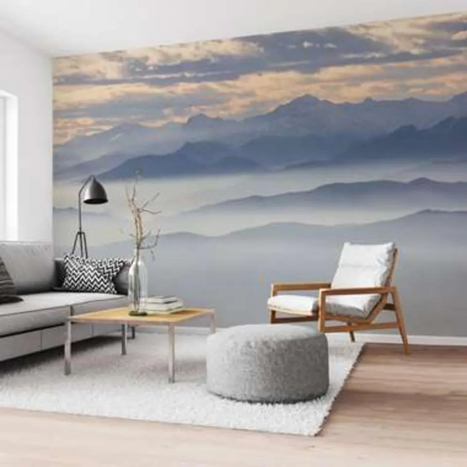 Fotobehang Mistige heuvels en besneeuwde bergtoppen - 260x384cm