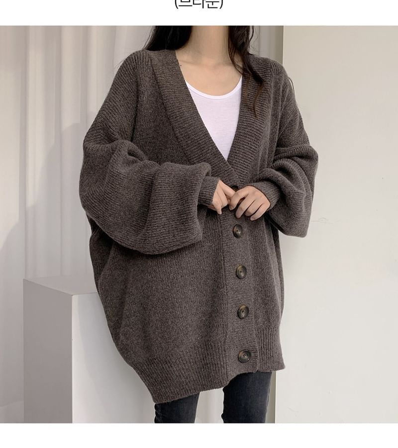 Frigga - V-hals effen oversized vest met knoopjes