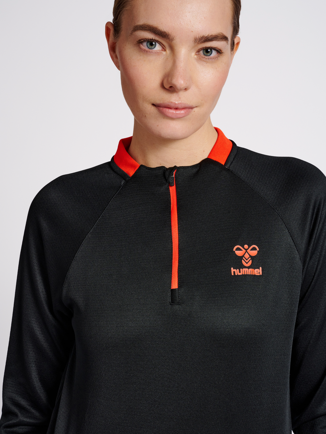 hmlGG12 ACTION HALF ZIP SWEAT WOMAN
