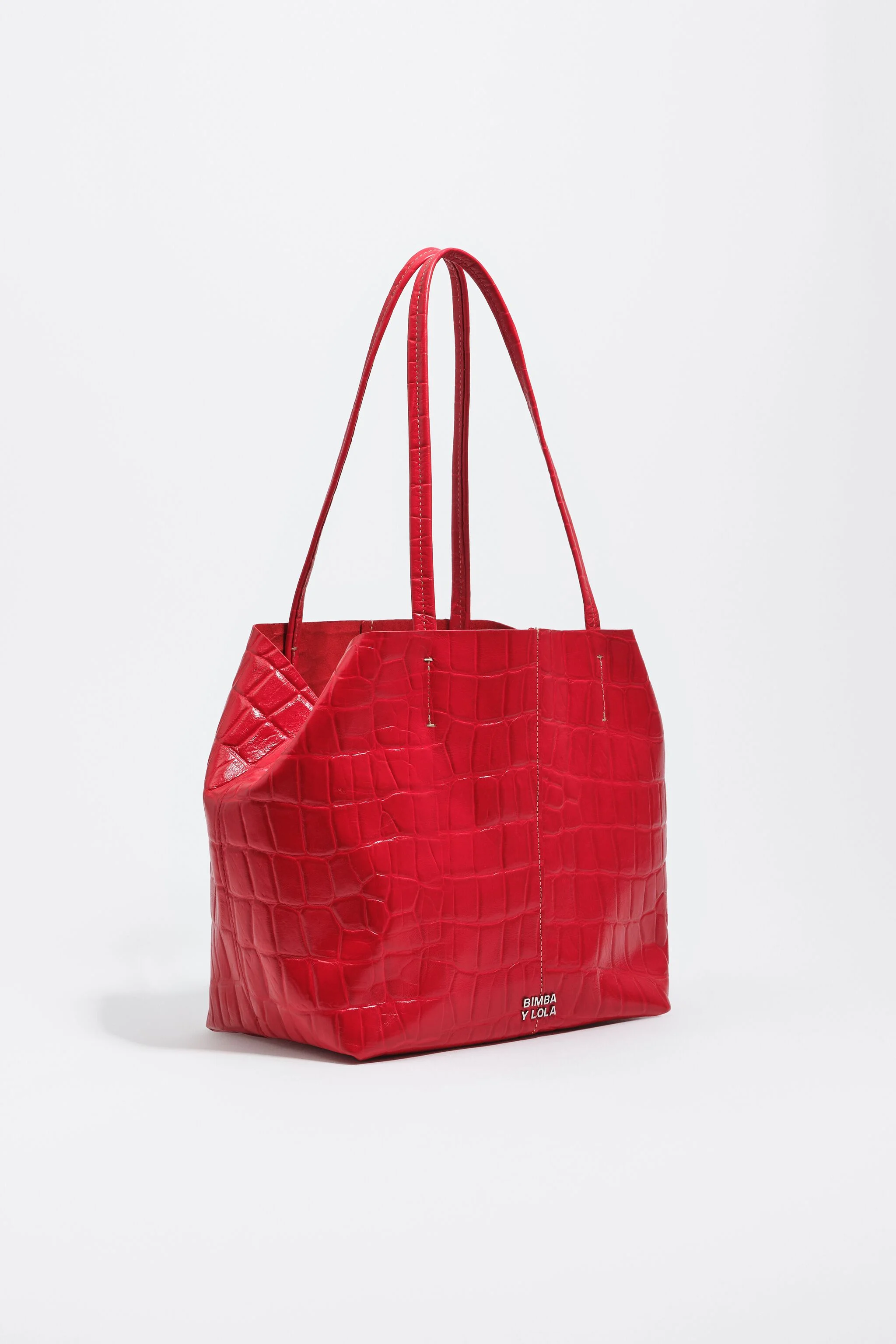 Bolsa de compras média em couro vermelho com estampa de crocodilo.