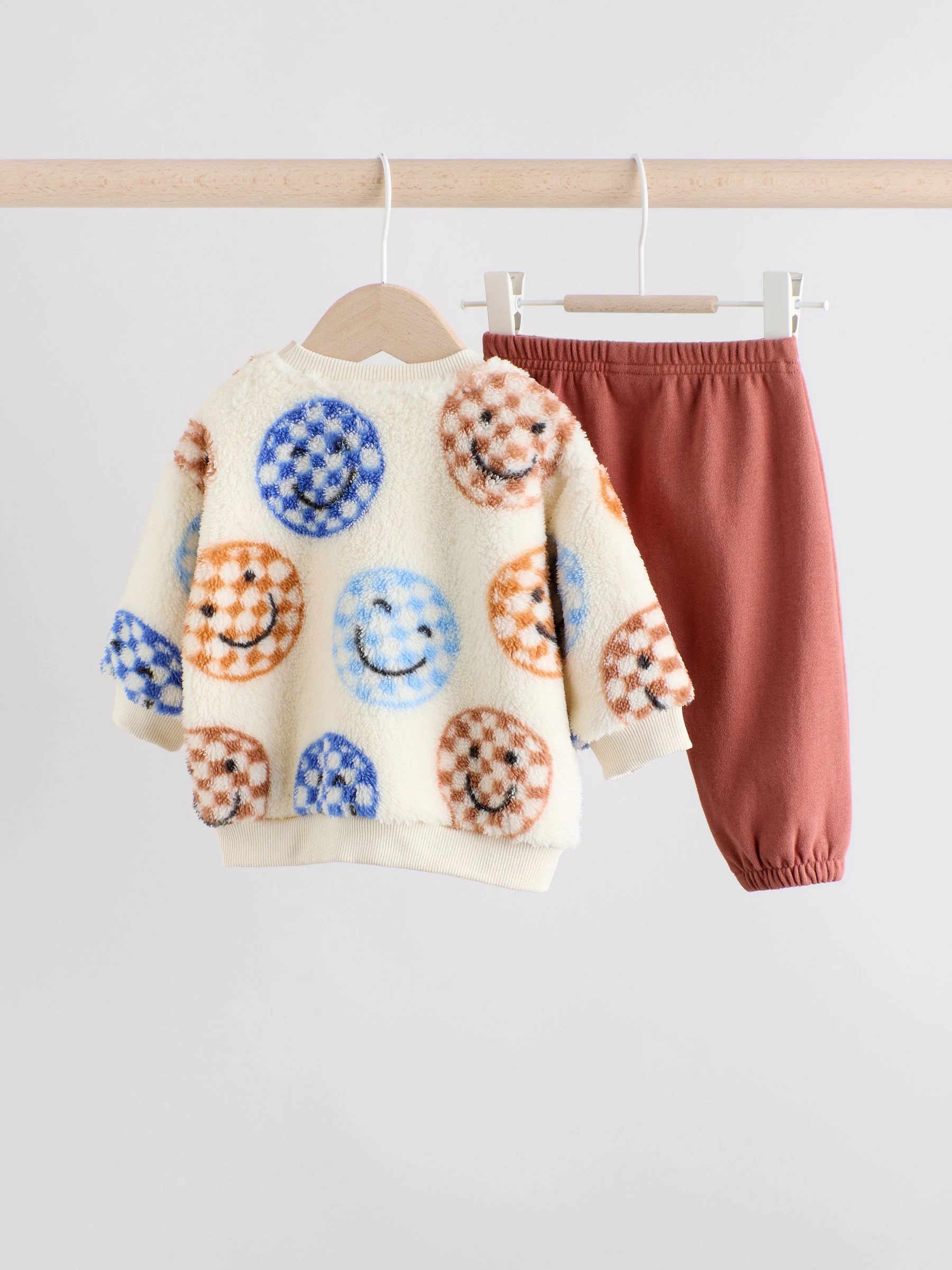 Blauwe gezichten met dambordmotief - Set van fleece top en joggingbroek voor baby's (0mnd -2jr)