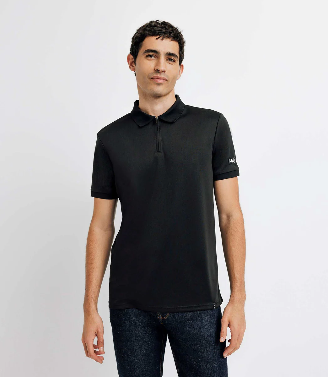 Polo col zippé avec patch noir