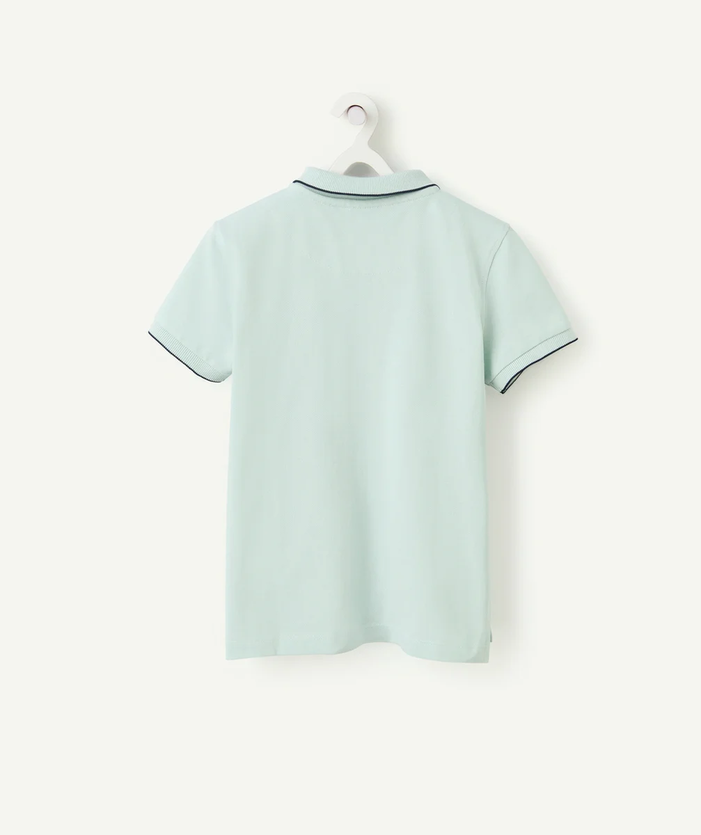 polo garçon en coton biologique bleu avec motifs surfs brodés