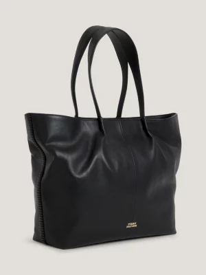 Bolsa de couro com placa de brasão