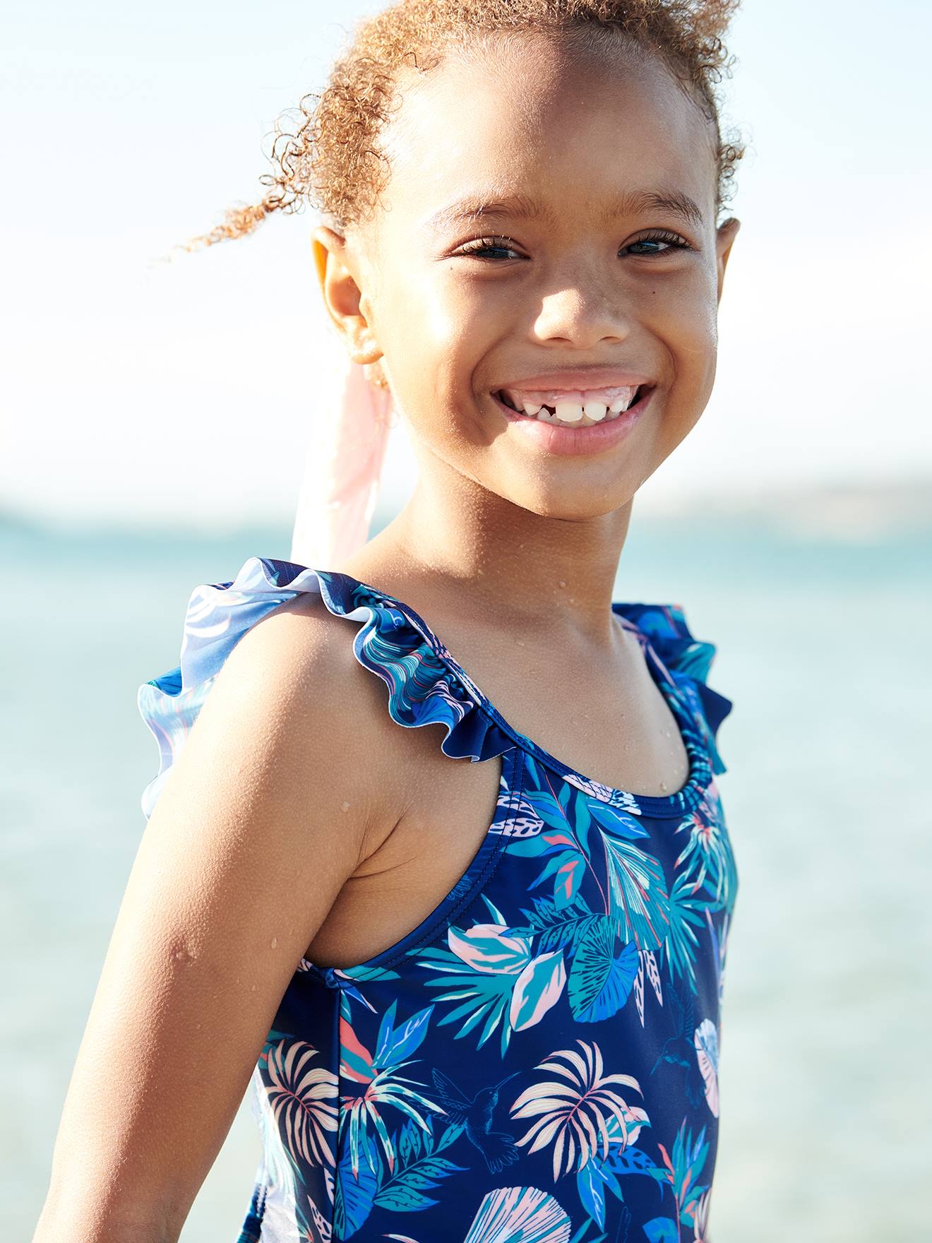 Maiô azul marinho com estampa tropical para meninas