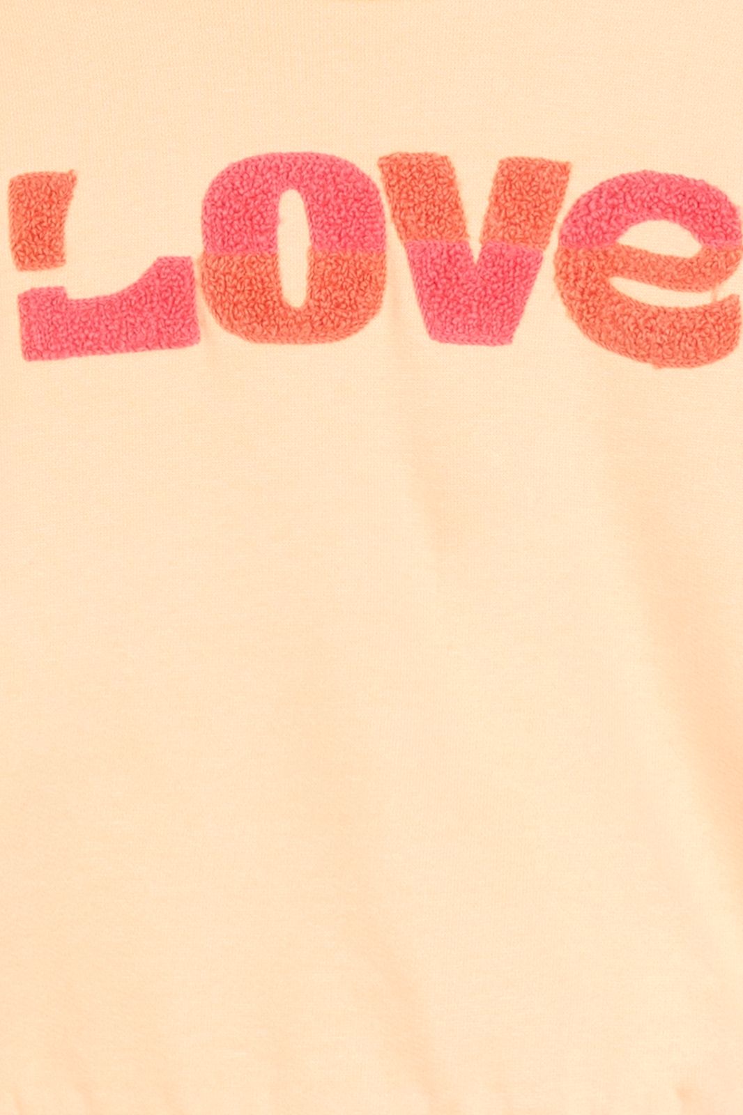 Pastel oranje sweater met badstof print