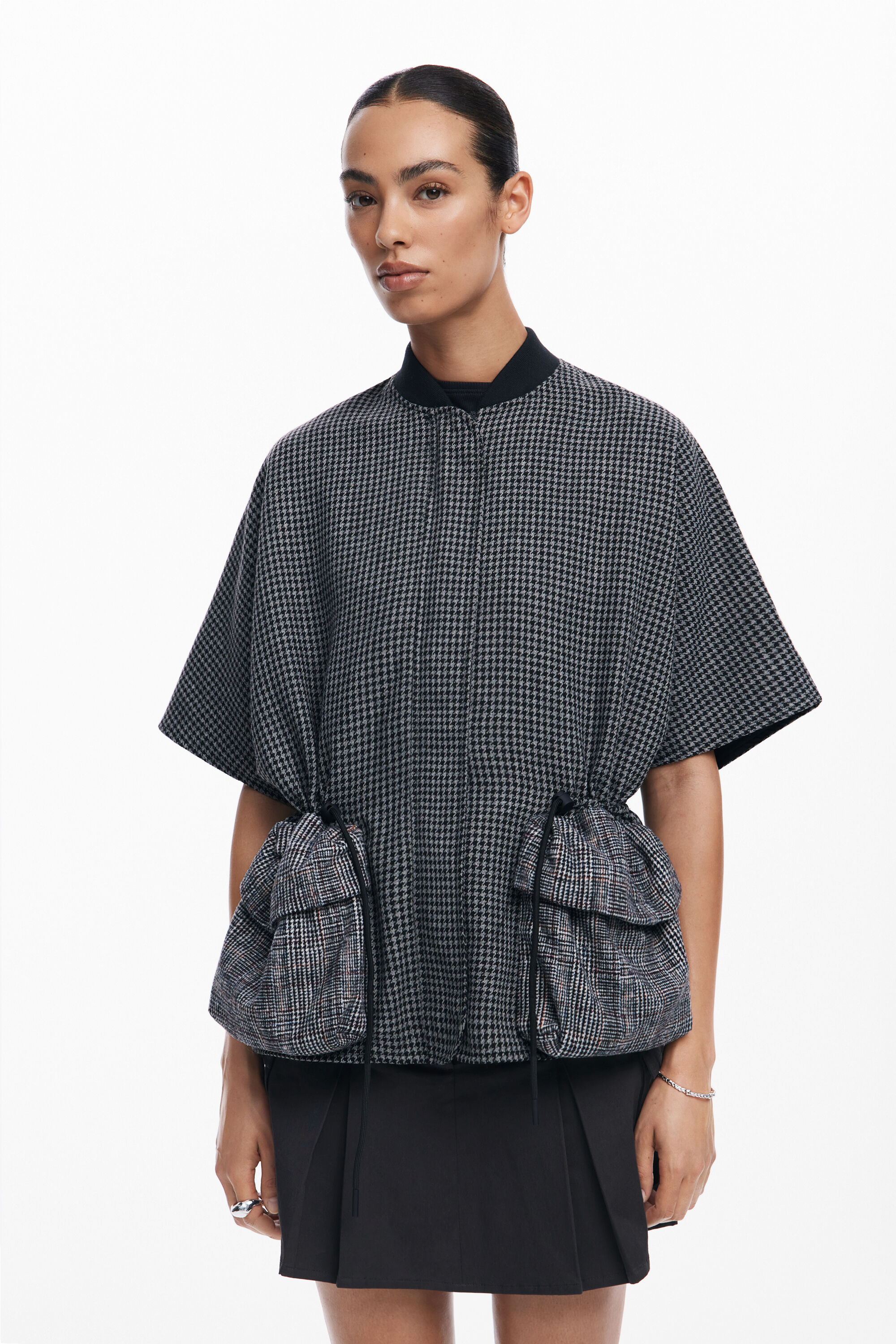 Poncho de pé de galo