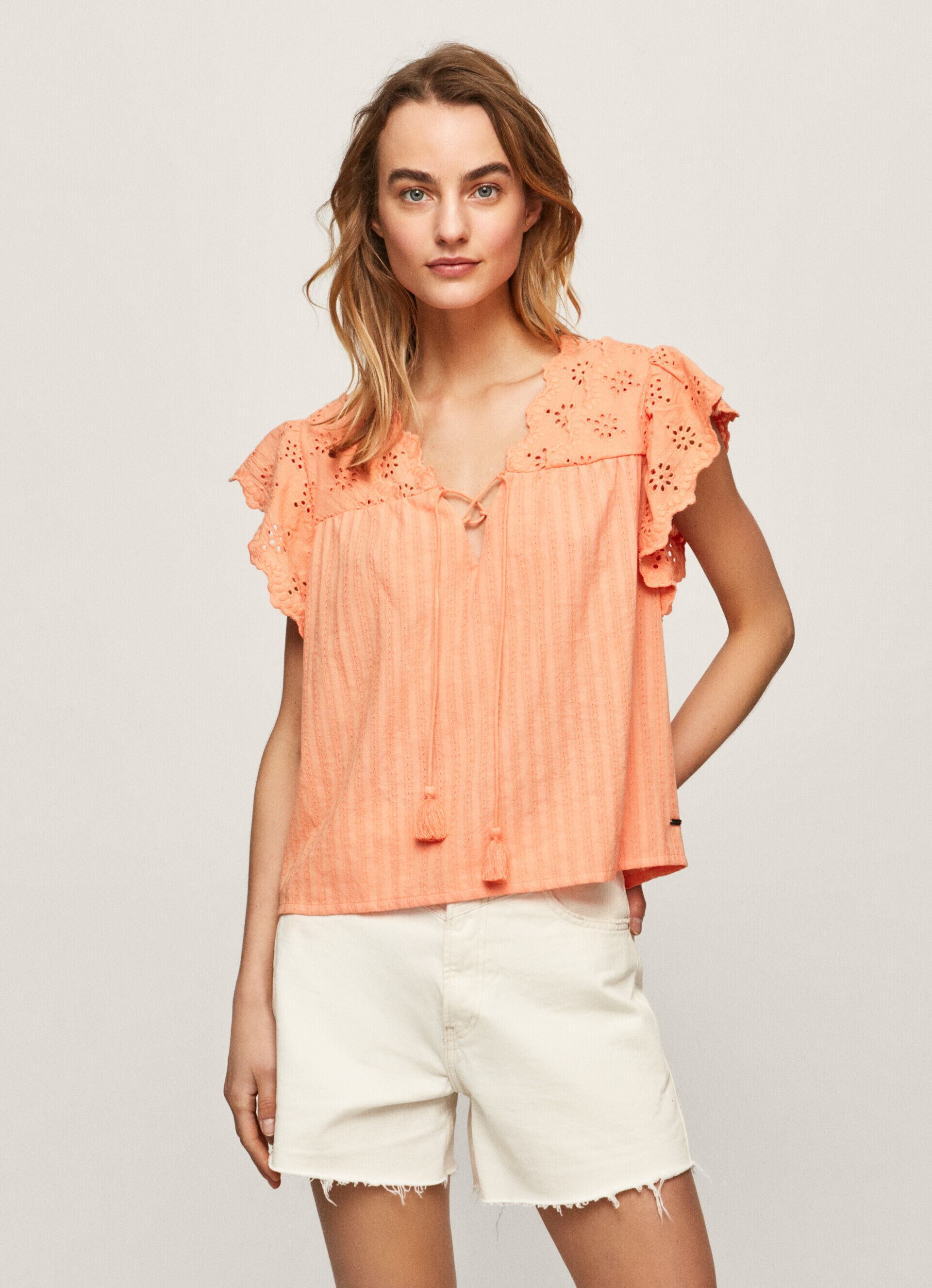 Blusa de algodão com detalhes vazados - pêssego e laranja