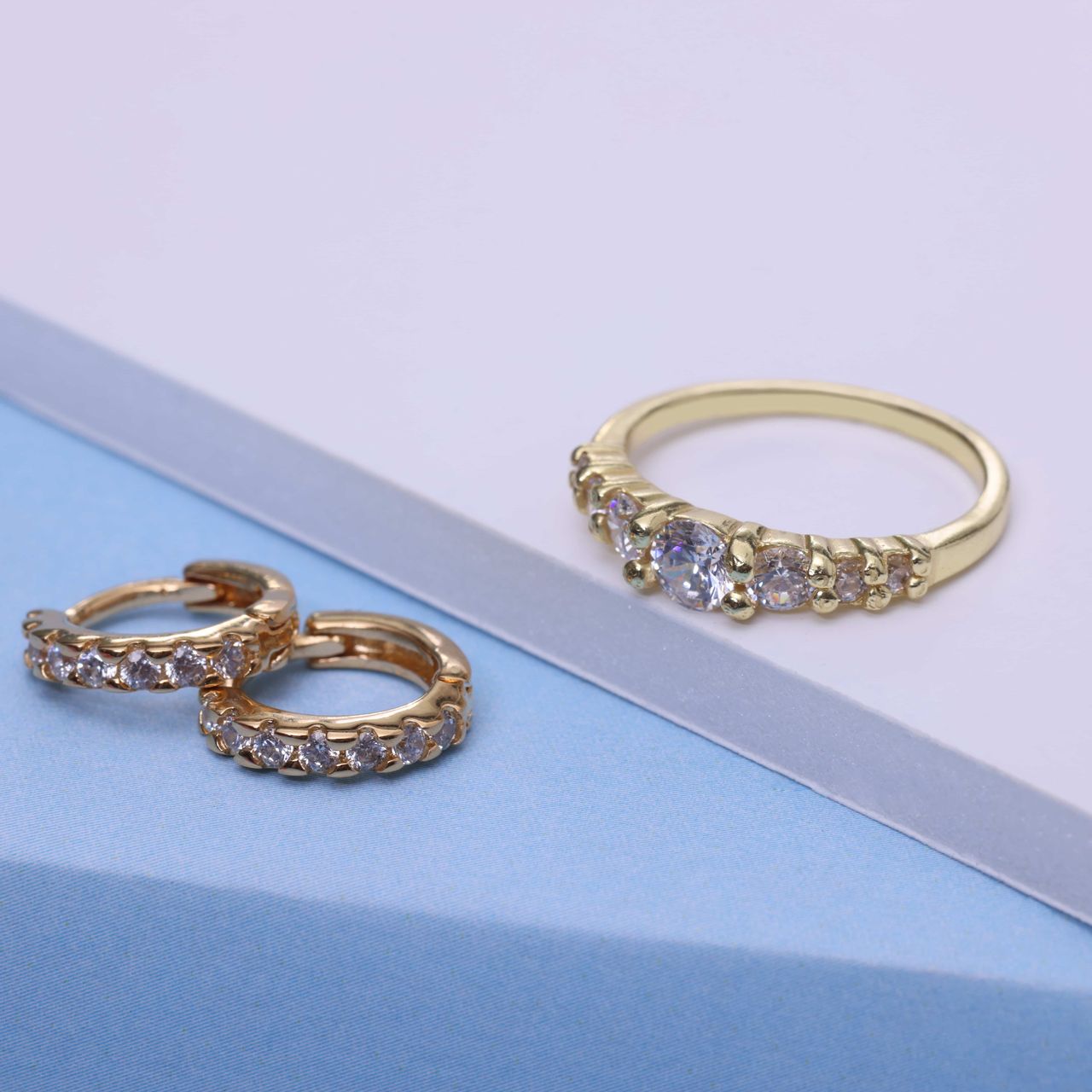 Zilveren goldplated kinderring met witte zirkonia