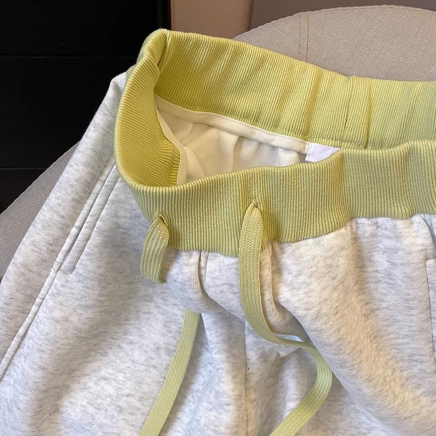 Fluffush - Tweekleurige joggingbroek met trekkoord in de taille en wijde pijpen