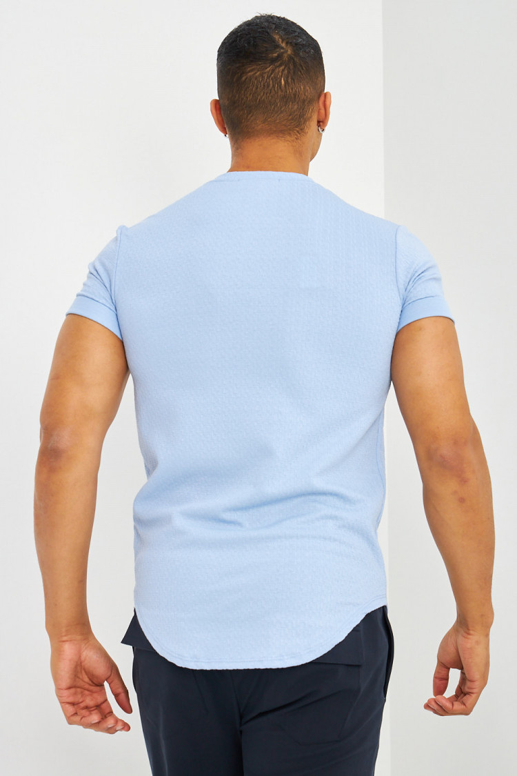 T-shirt motif relief bleu ciel manches courtes à revers