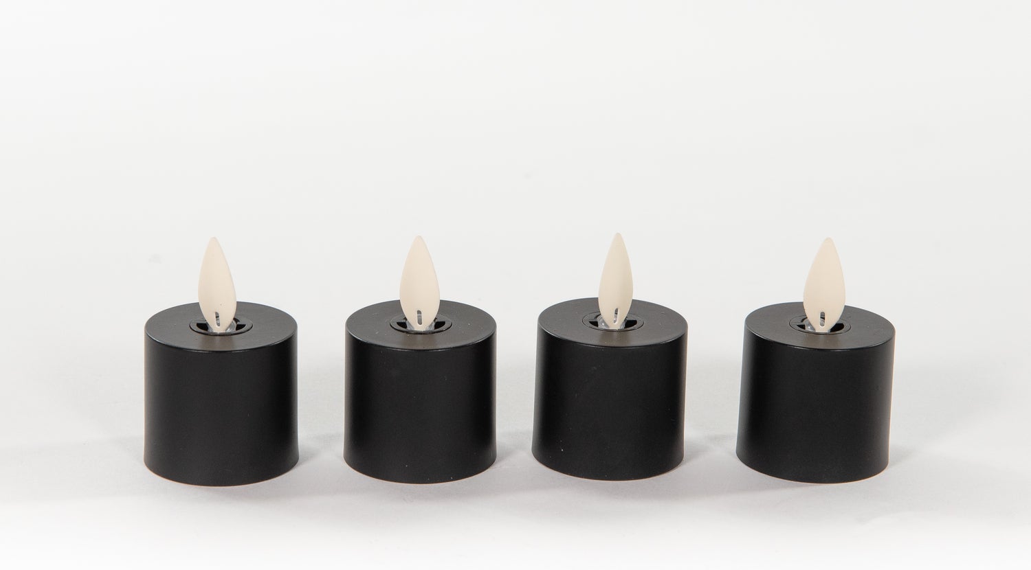 Anna's Collection LED uitbreidingsset waxinelicht met timer zwart D 3,8 H 6 cm 4 stuks