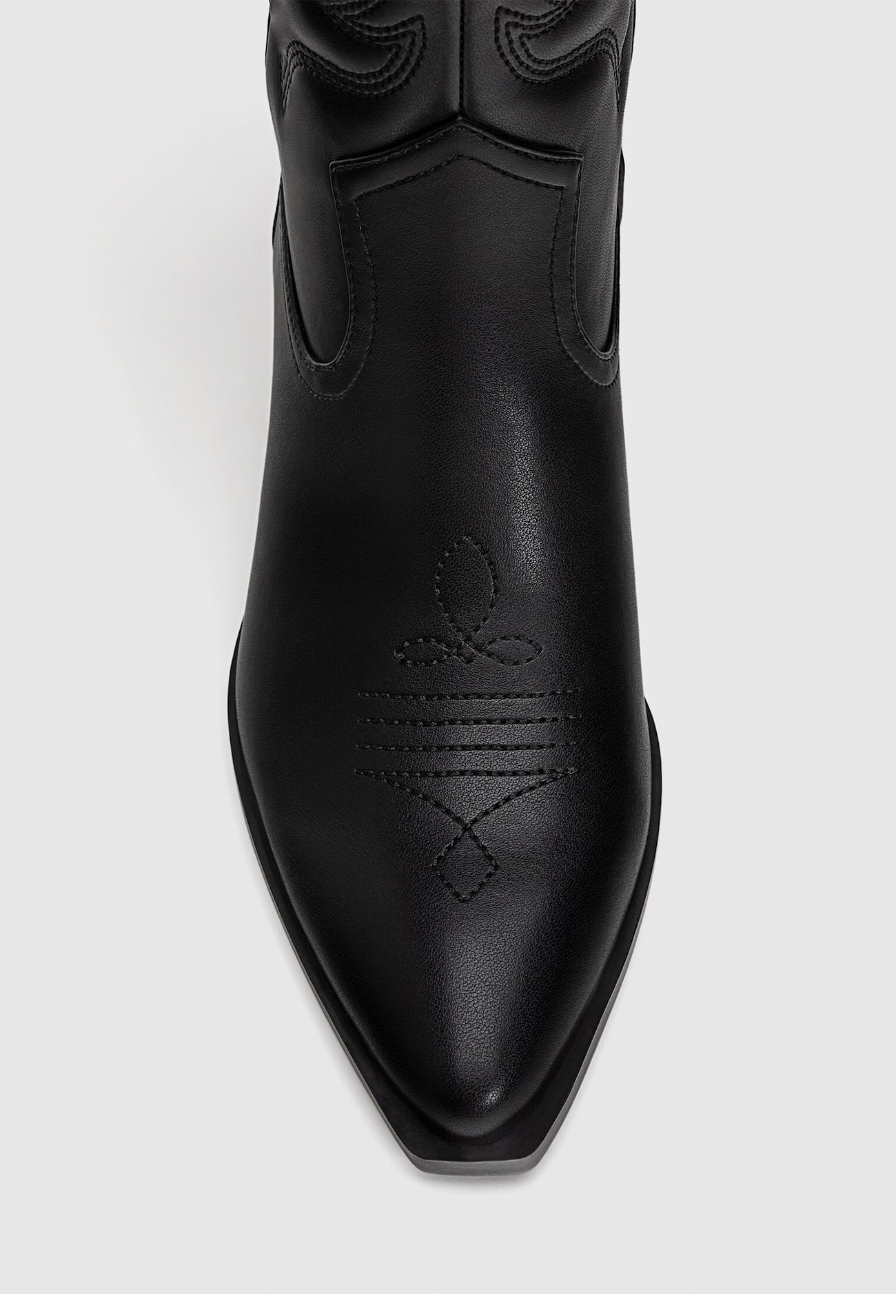 Botas de cowboy com salto alto