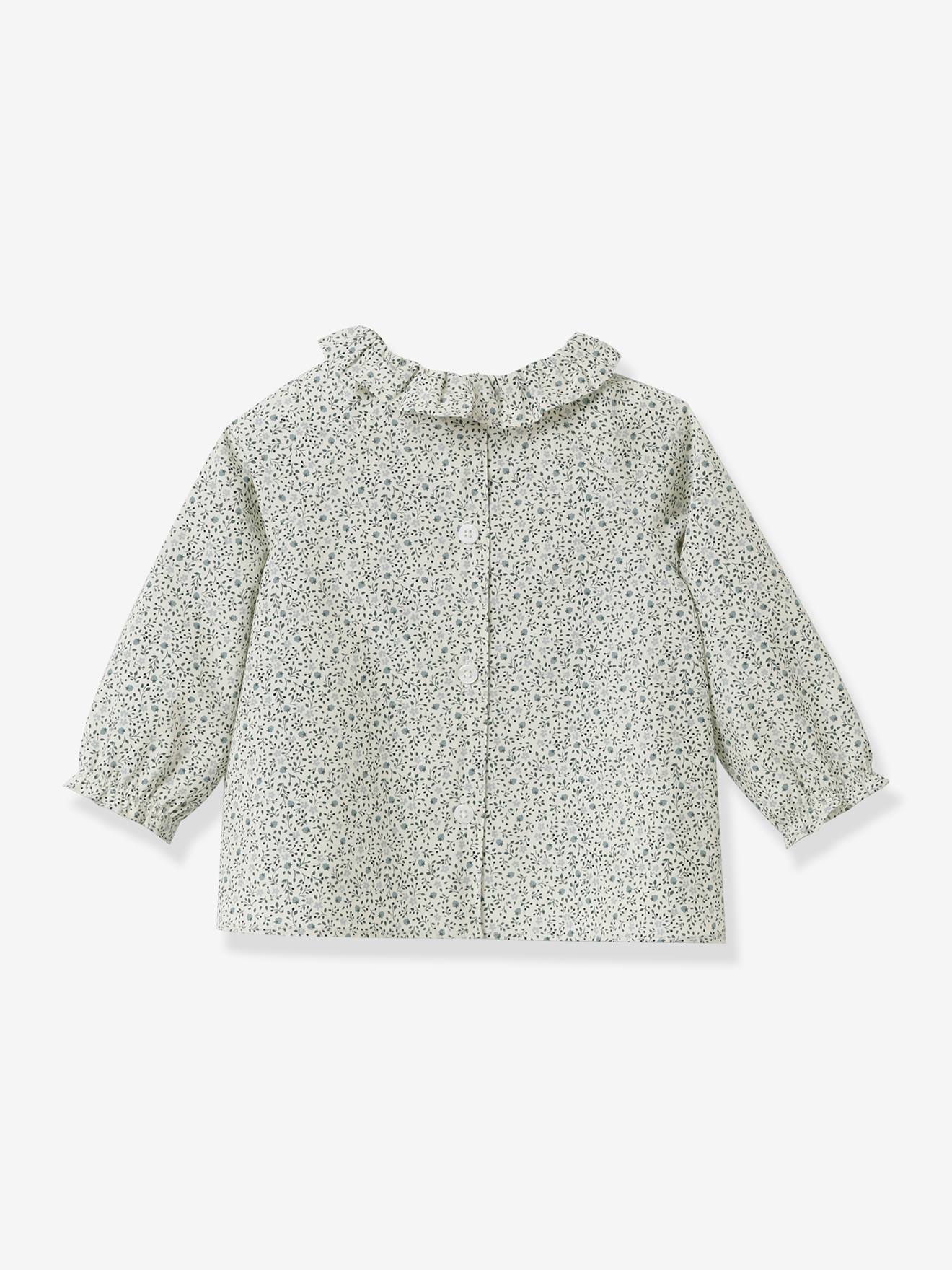 Blusa infantil CYRILLUS com estampa floral azul.