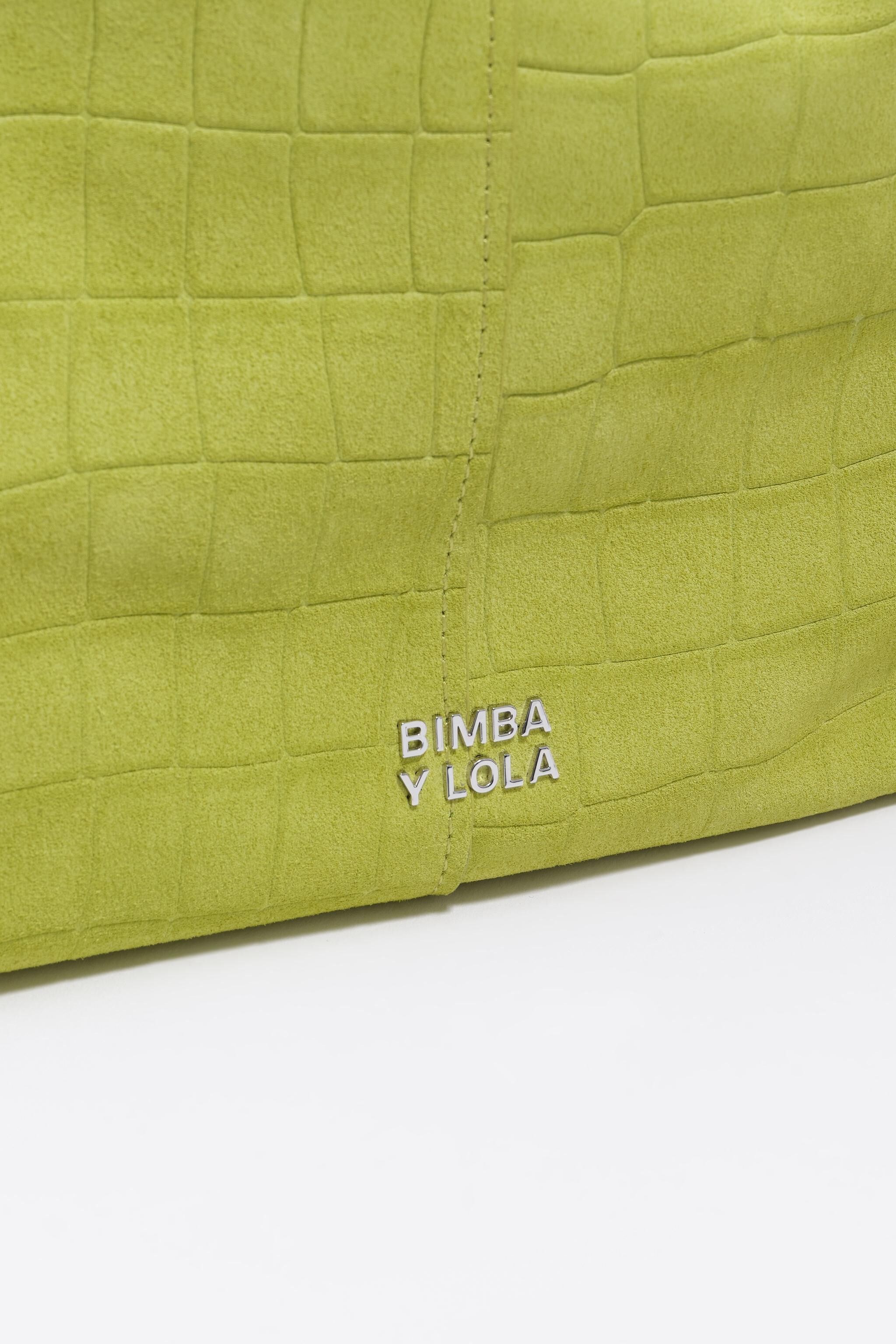 Bolsa de compras grande em camurça na cor lima com estampa de crocodilo.