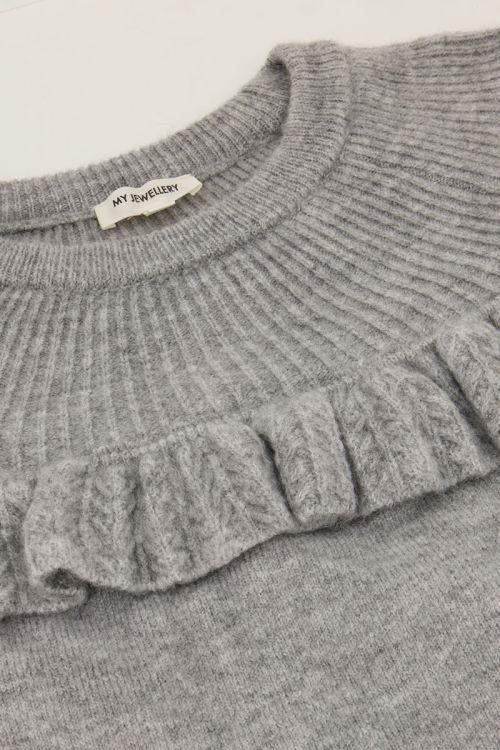 Grijze trui met ruffles